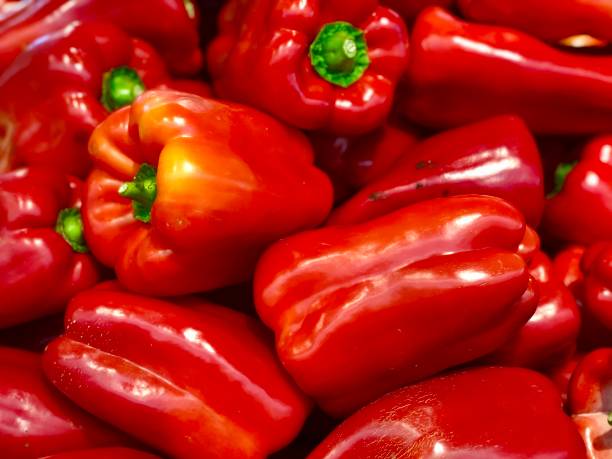 istock Red capsicums closeup view 1215302110