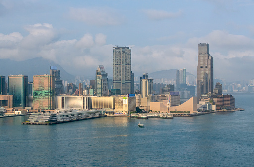 March 26, 2020, Hong Kong: A panoramic view of Tsim Sha Tsui with Star Ferry Pier and the Clock Tower is seen on a sunny day.