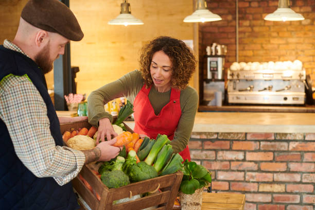 farmer to fork farmer delivers local produce to restaurant homegrown produce stock pictures, royalty-free photos & images