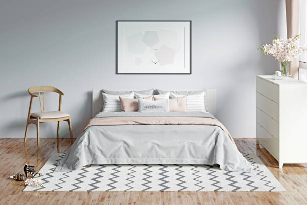 istock Modern light gray romantic bedroom with a window, flowers, a horizontal poster under the bed with plaid and pillows. 1215304145