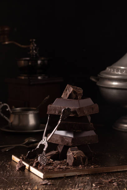 istock Still life with dark chocolate and tin dishes 1215304547