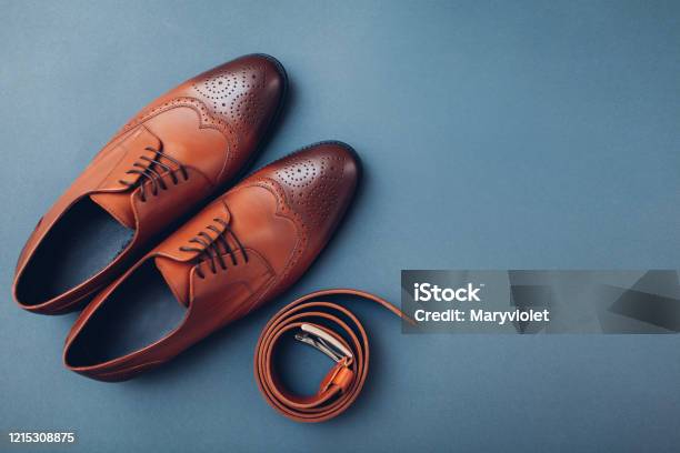Oxford Male Brogues Shoes With Accessories Mens Fashion Classical Brown Leather Footwear With Belt Space Stock Photo - Download Image Now