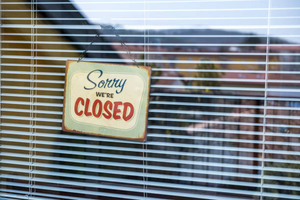 istock Sorry we're CLOSED Notice on Window Due To Coronavirus Quarantine 1215308893