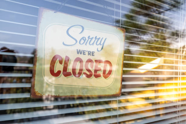 istock Sorry we're CLOSED Notice on Window Due To Coronavirus Quarantine 1215309043