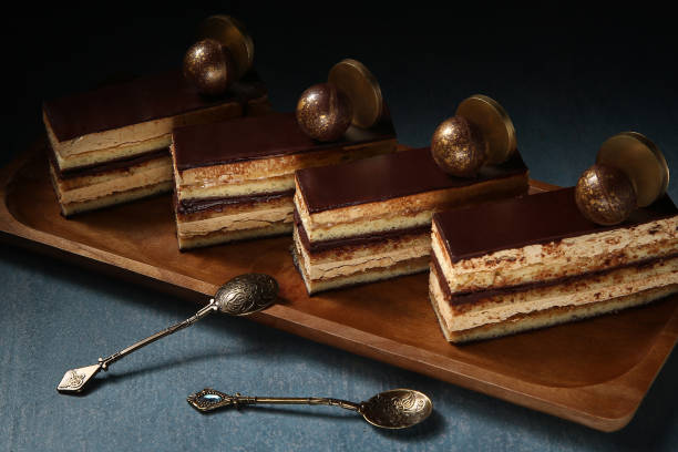 istock Opera cake at the a La carte desserts , cakes on a dark background 1215309949