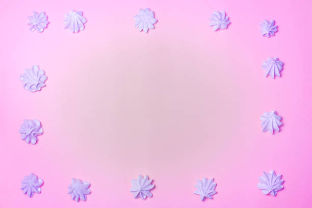 istock Bright cakes on a pink background. Place for text 1215311588