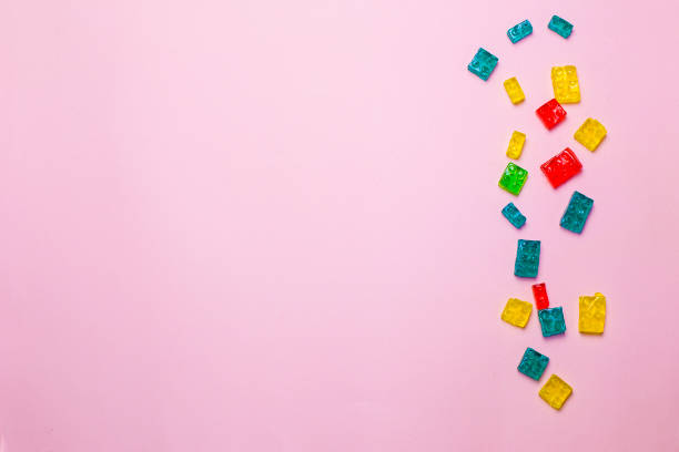 istock Multi-colored jelly candies in the shape of a constructor 1215311626