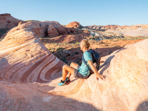 istock Hiker man contemplating red sandstone 1215312310