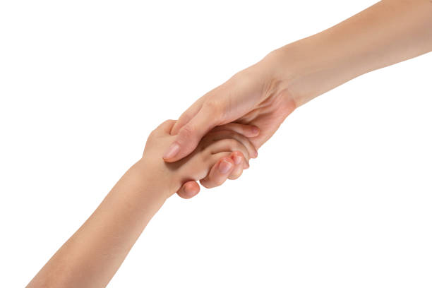 istock Mom’s hand holds the baby’s hand. 1215317492