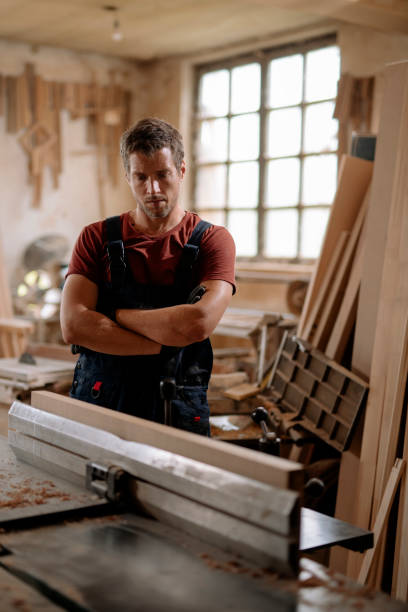 istock Young handsome carpenter stock photo 1215318409