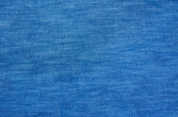 istock Textured striped blue jeans denim linen fabric background 1215318831