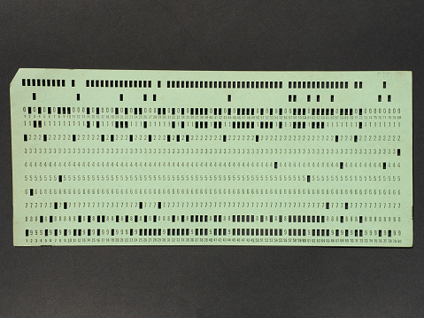 vintage punched card for computer data storage and programming