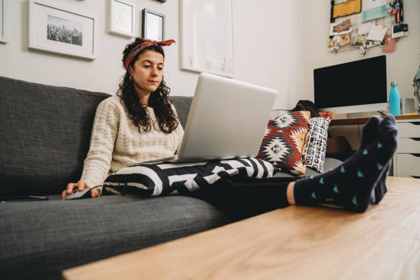 istock Young woman working from home 1215319704