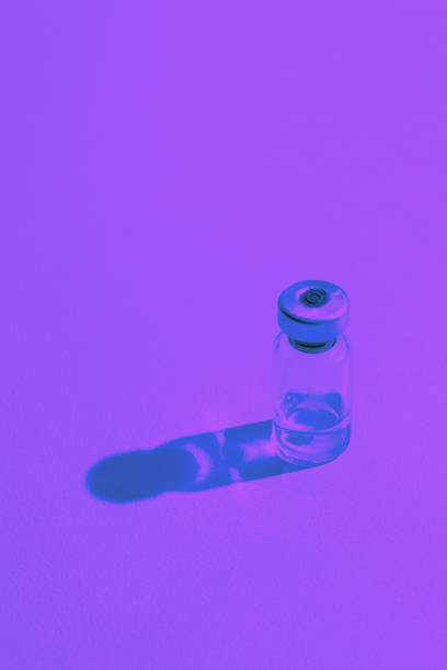 istock Coronavirus vaccine in neon colors. COVID-19 concept. 1215320043