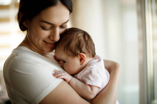 istock Mother and baby at home 1215320145