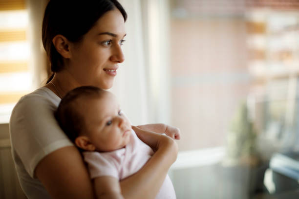 istock Mother and baby at home 1215320173