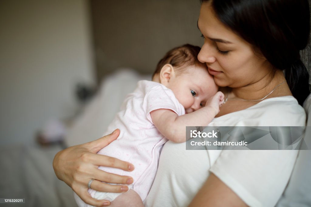 Mother and baby at home Baby - Human Age Stock Photo