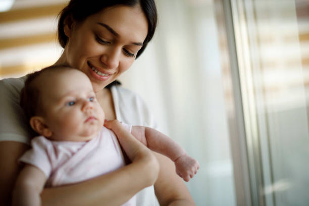 istock Mother and baby at home 1215320338