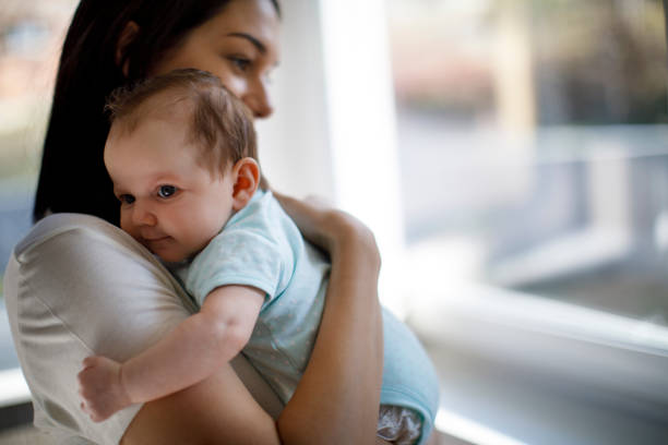 istock Mother and baby at home 1215320503