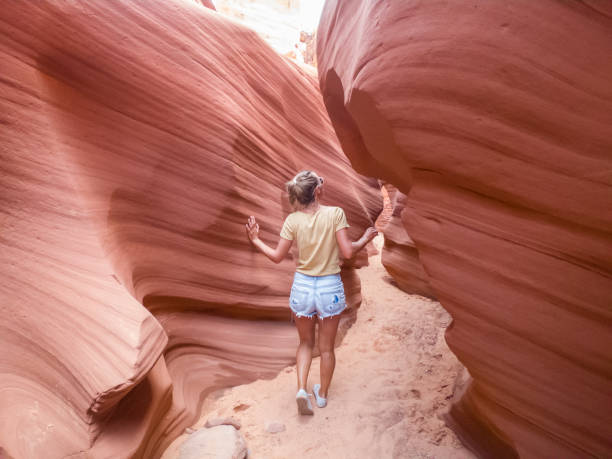 istock Young woman contemplating Antelope Canyon 1215320526
