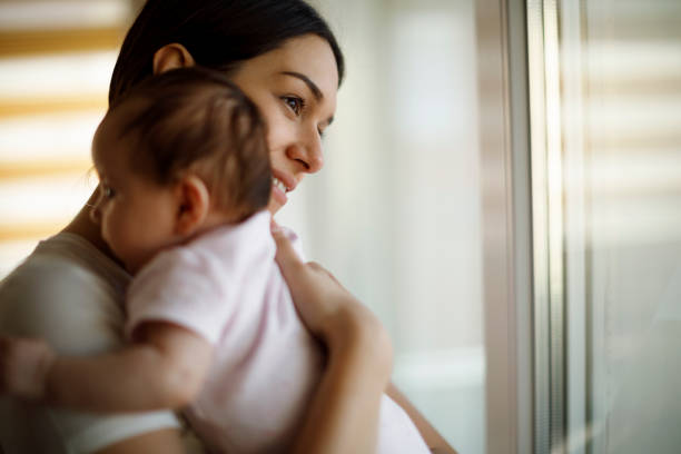 istock Mother and baby at home 1215320604