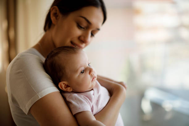 istock Mother and baby at home 1215320659