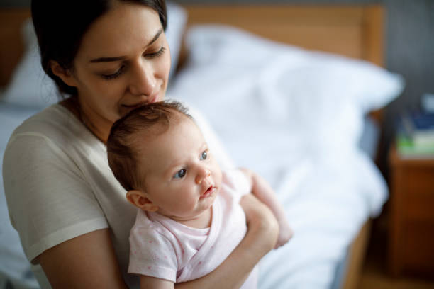 istock Mother and baby at home 1215321375