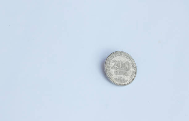 istock Two hundred Vietnam Dong coin (VND) on the white background. 1215326074