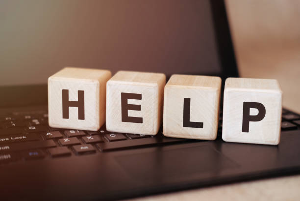 istock HELP concept on wooden cubes on a black tablet 1215329483