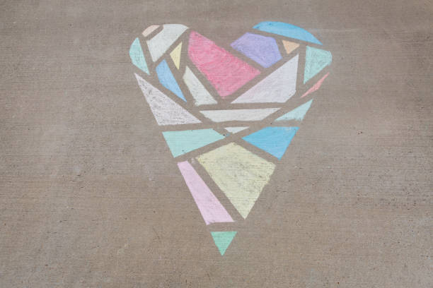 Geometric heart created with sidewalk chalk and painter's tape