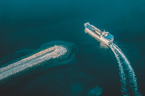 cargo ship moving out of harbor