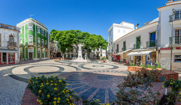 Panoramic picture of Praca gil Eannes in Lagos during daytime with blue skies in summer Panoramic picture of Praca gil Eannes in Lagos during daytime with blue skies lagos portugal stock pictures, royalty-free photos & images