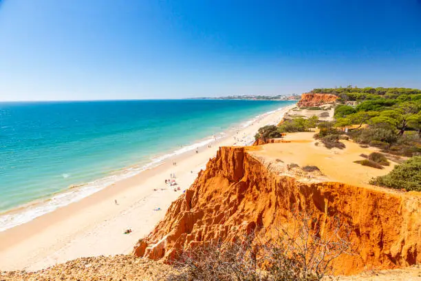 Photo of Panoramic picture of Praia da Falesia in Portugal in summer