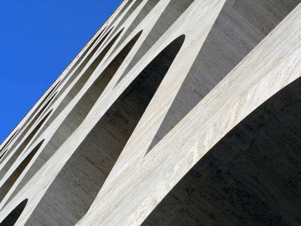 Italy, Rome EUR: Palazzo della Civilta Italiana, also known as the Palazzo della Civilta del Lavoro, Fascist architecture icon. Close up of the 54 arches of its west facade. Designed for 1942 World's fair, the Palazzo is located in Roma EUR quarter, Architetcs G. Guerrini, E. La Padula and M. Romano