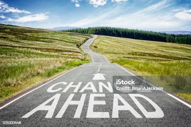 Change Ahead Sign On The Road Disappearing Into The Distance Stock Photo - Download Image Now