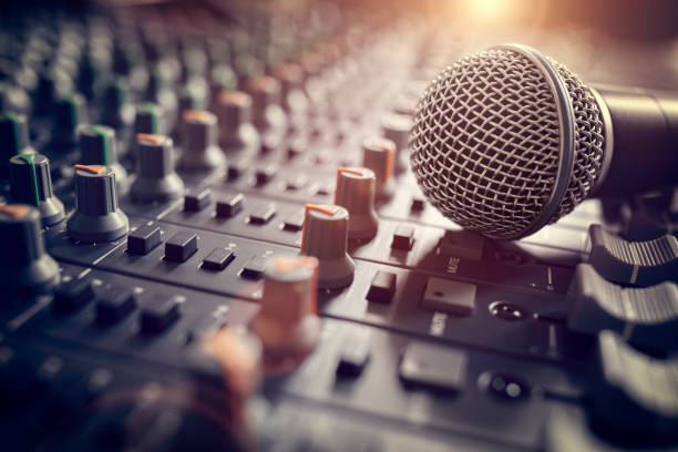 istock Sound recording studio mixing desk with microphone on mixer 1215333465