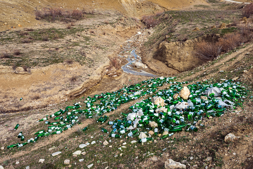 Yalama, Azerbaijan  February 28. Environmental pollution by glass bottles