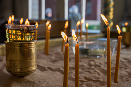 Votive candles in church