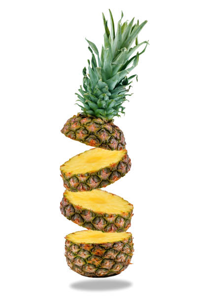 istock Flying fresh ripe pineapple slices isolated on a white background. Close-up. 1215336803