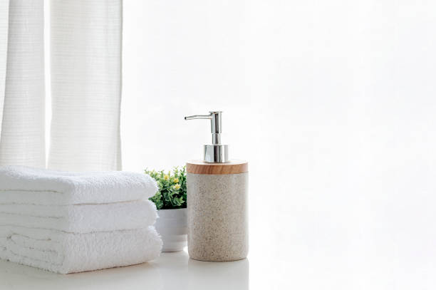 istock Bath towels on wite table in bathroom. 1215337915
