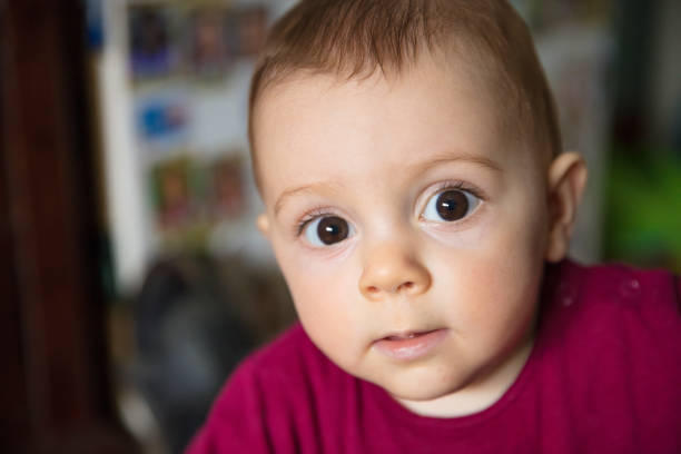 New born baby girl face close-up