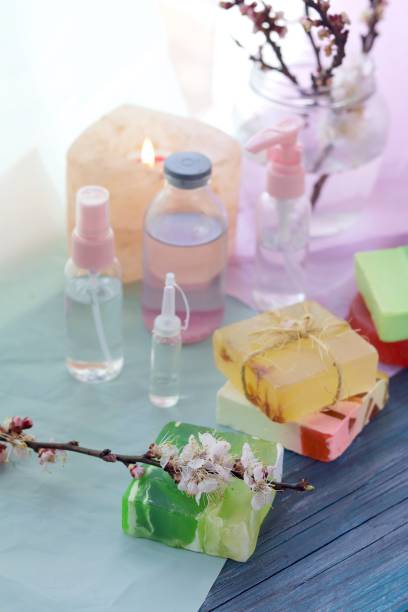 istock Soap, antiseptic liquid, aroma lamp with a lit candle on the windowsill 1215343665