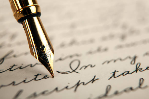 istock fountain pen on paper with ink text on the paper closeup 1215346973