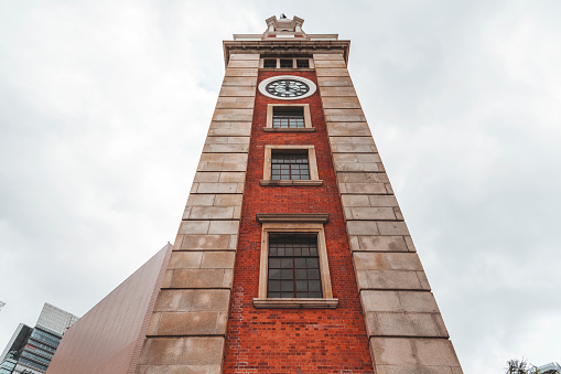 The Clock Tower in Tsim Sha Tsui is a Hong Kong landmark, located on the southern shore of Tsim Sha Tsui in Kowloon near the Star Ferry harbor and Avenue of Stars.