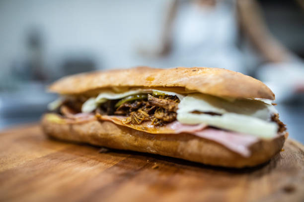istock Sandwich on cutting board at commercial kitchen 1215347952