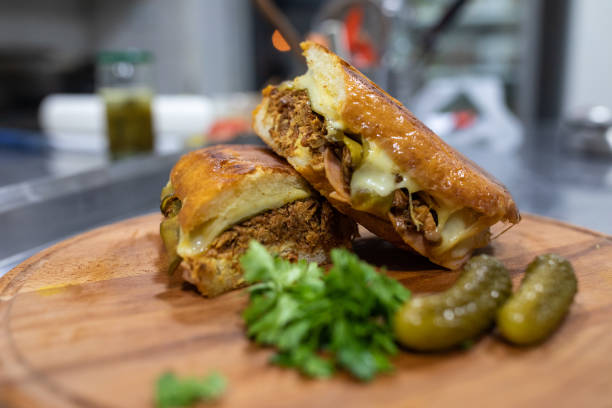 istock Delicious sandwich with beef meat on cutting board 1215348039