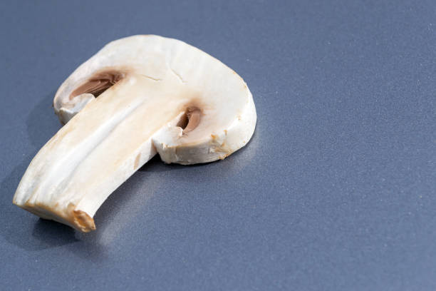 istock Cut white mushroom mushroom. 1215349156