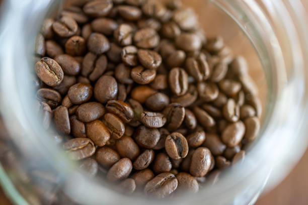 istock Roasted coffee beans in the glass mug 1215351987
