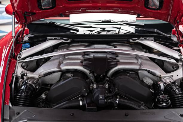 istock Powerful twelve cylinder engine mounted in coupe car. 1215353874