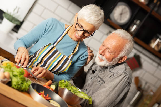 istock Couple cooking together 1215354610